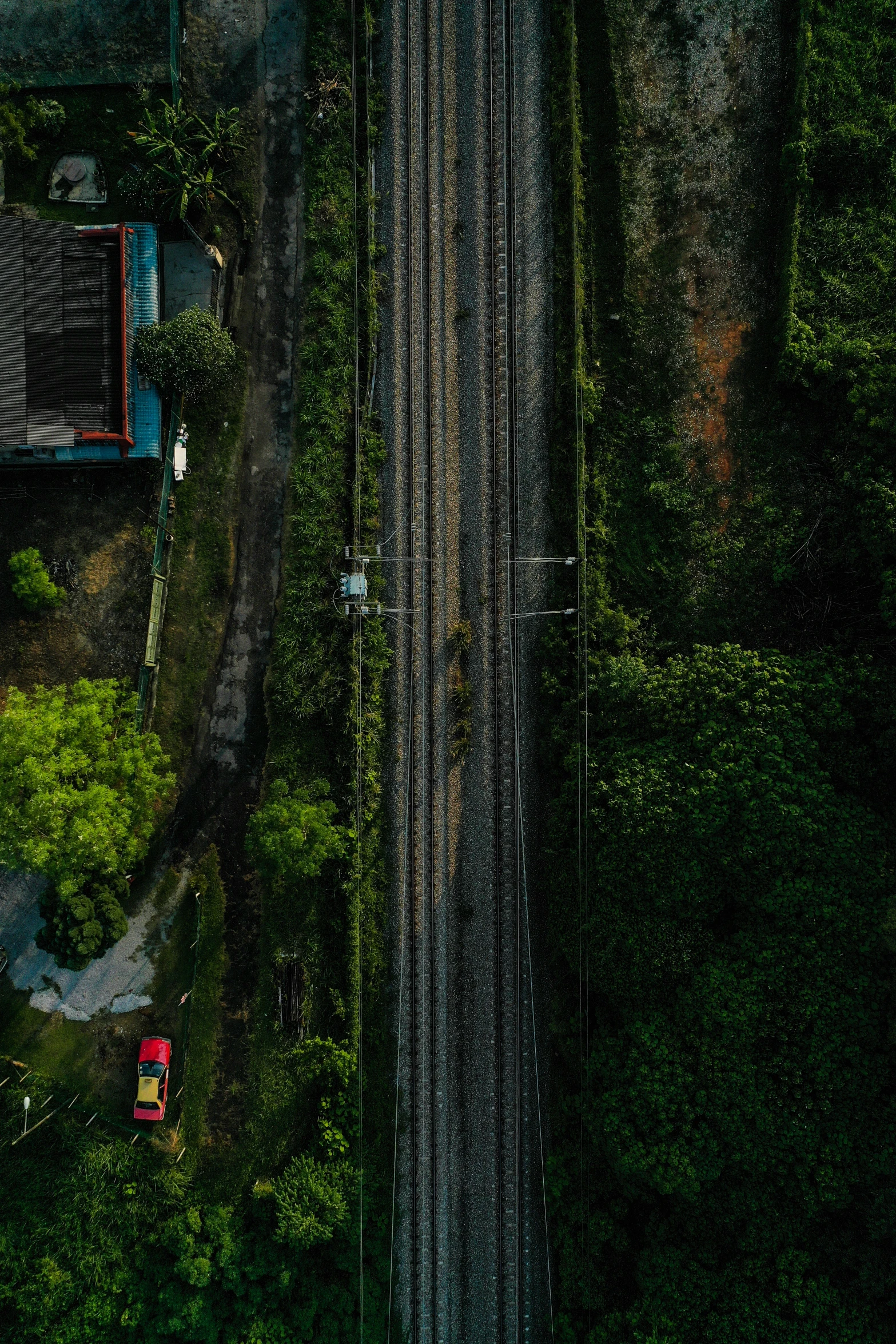 an aerial po shows a vehicle driving down the road