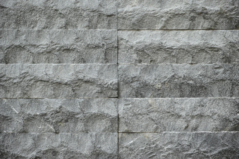 the side of a cement building that is covered in s