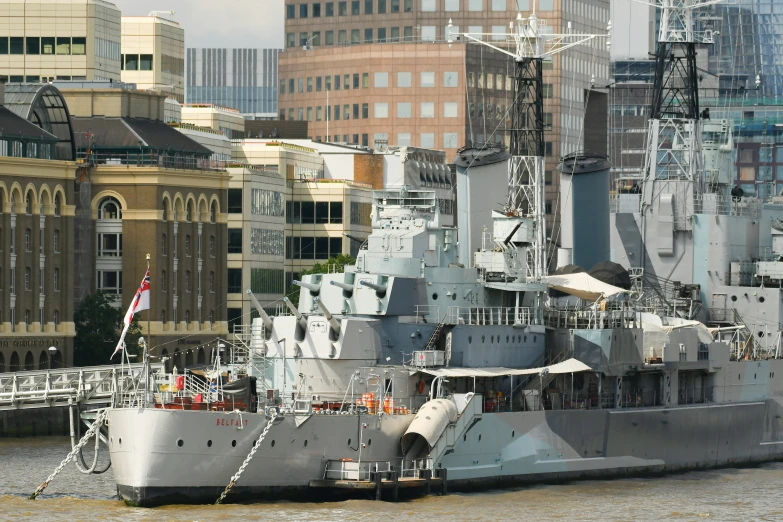 an aircraft is docked in the water next to the city