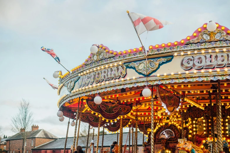 the merry go round is decorated for the holiday season