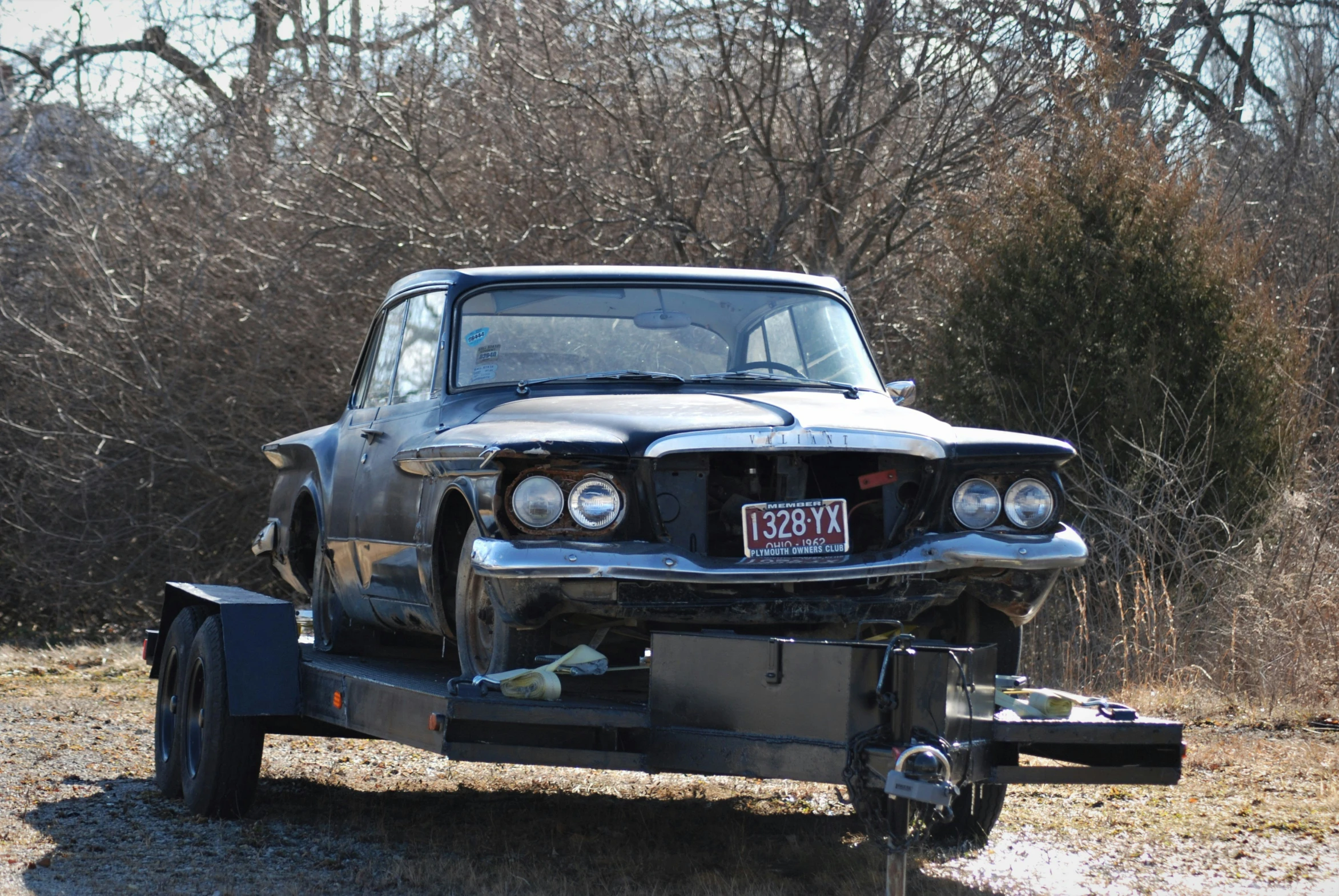 the front end of an old, run down tow truck