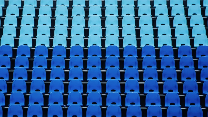 several rows of blue plastic slats with black metal rings
