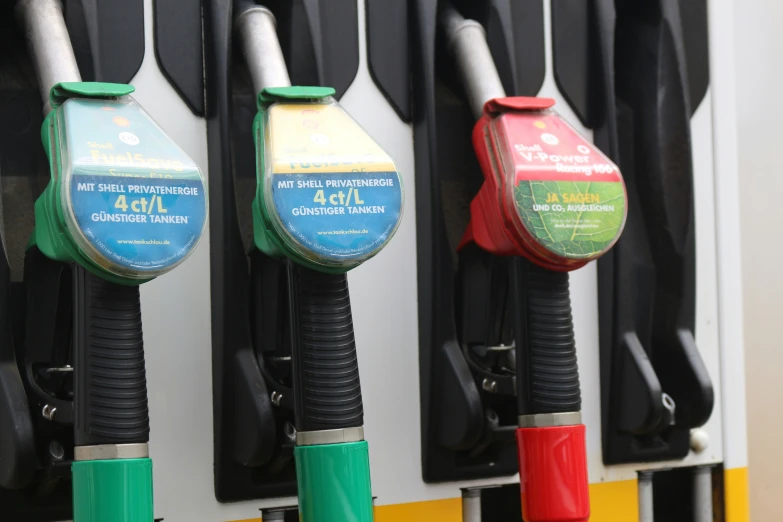 two gasoline fuel pumps are shown at the pump