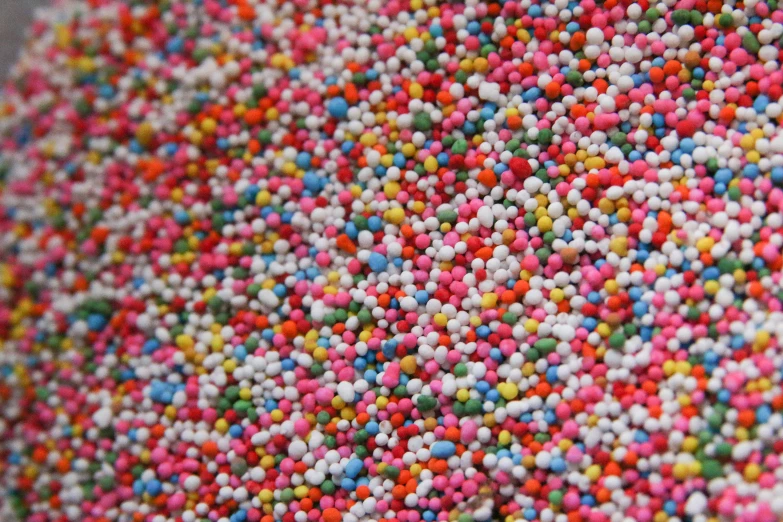 a pile of cake - mix sprinkles in the middle of a table