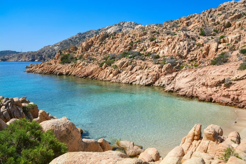 the mountains are covered in rocks and water