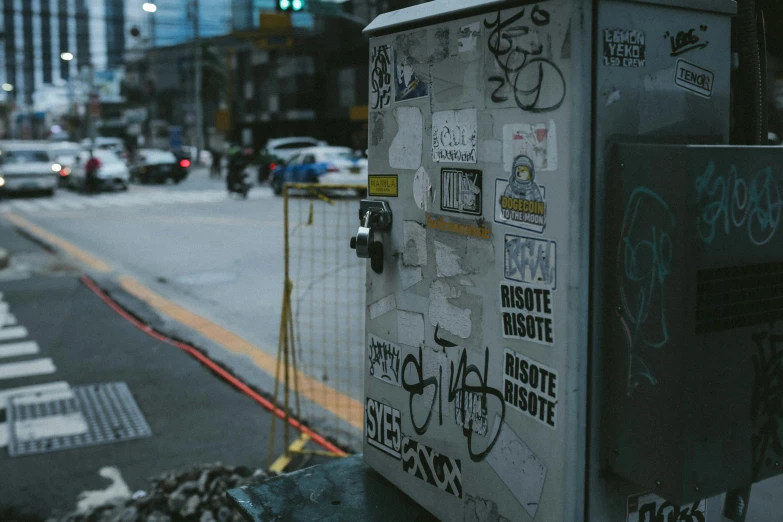 a refrigerator on the side of a busy street