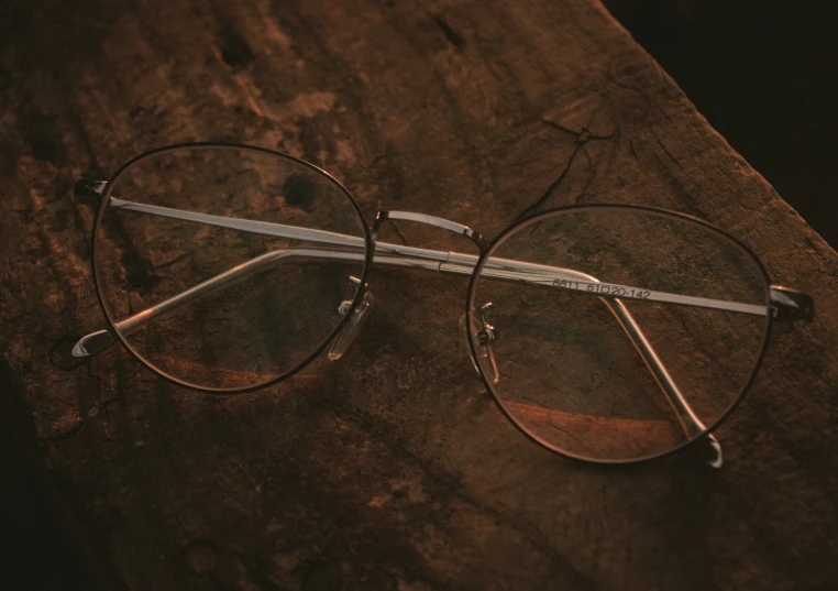 glasses on table with wooden planks and metal handles