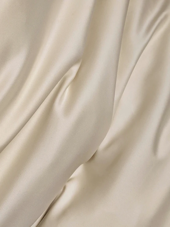 fabric or sheets close up in beige