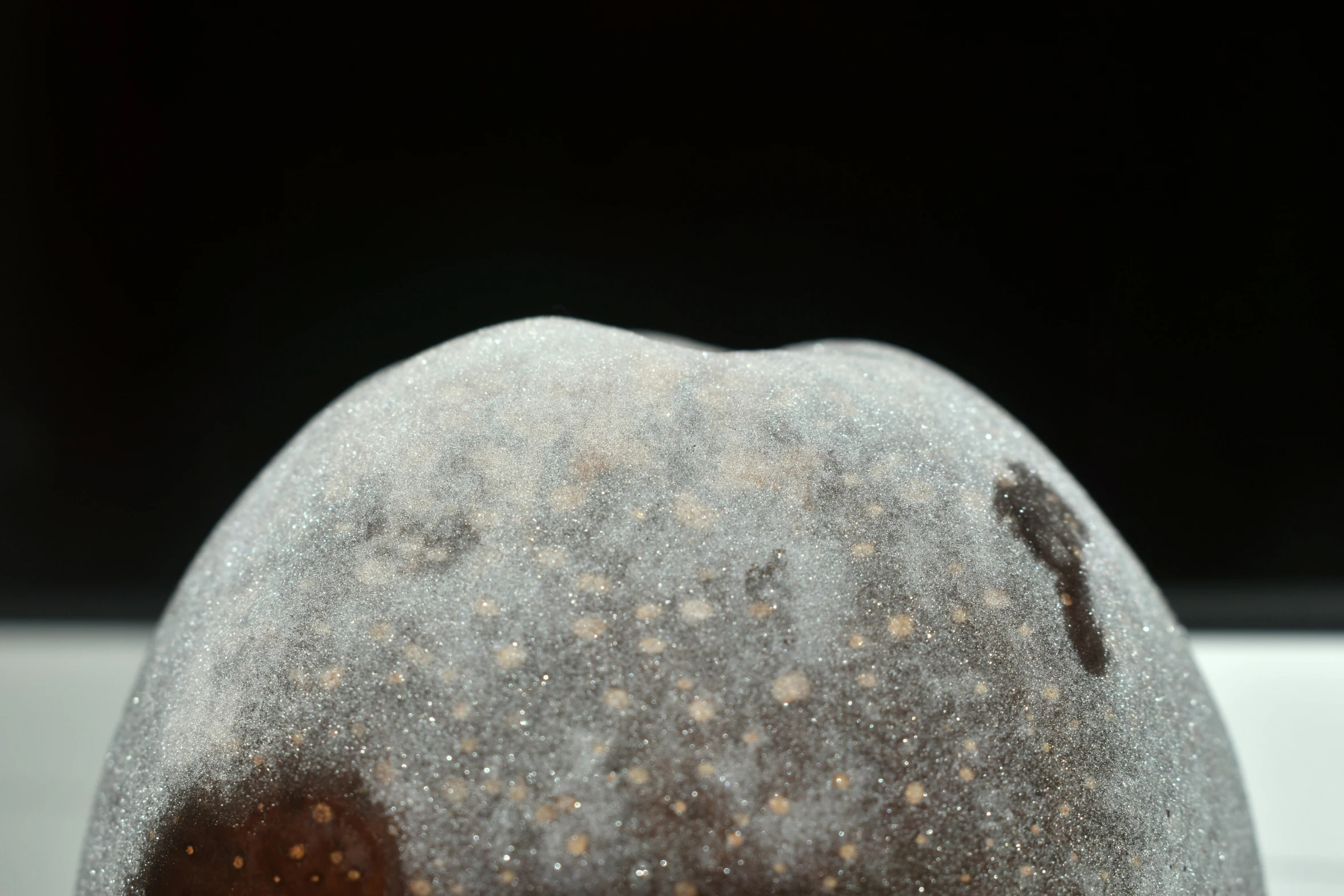 a ball with soing white and brown on it