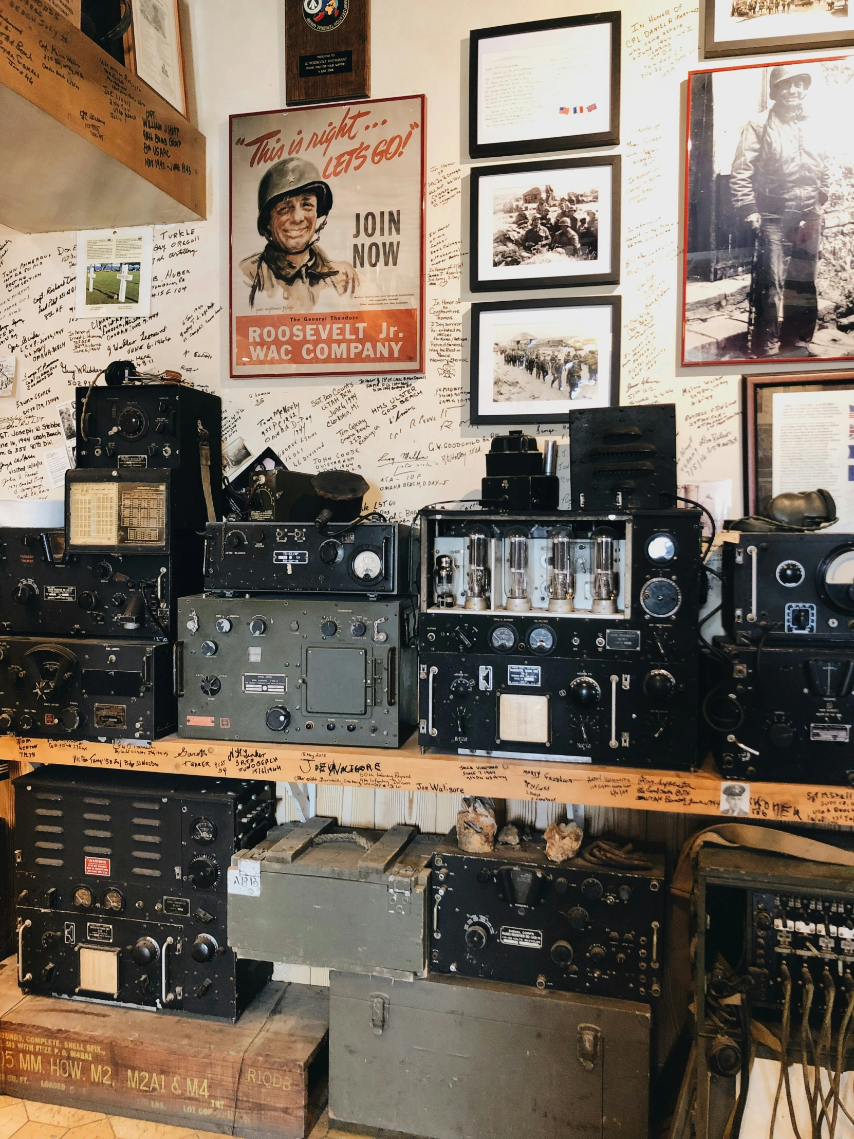 a room filled with lots of old cameras