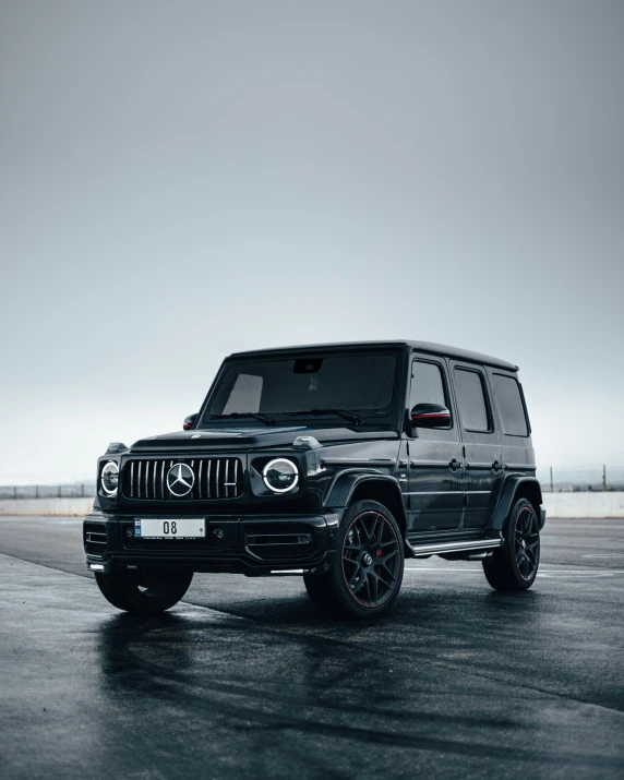 the front of a black mercedes benz benz - benz amg amg