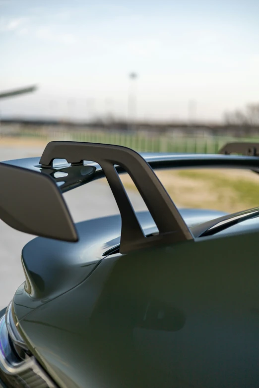 the side mirror of a car near an airport