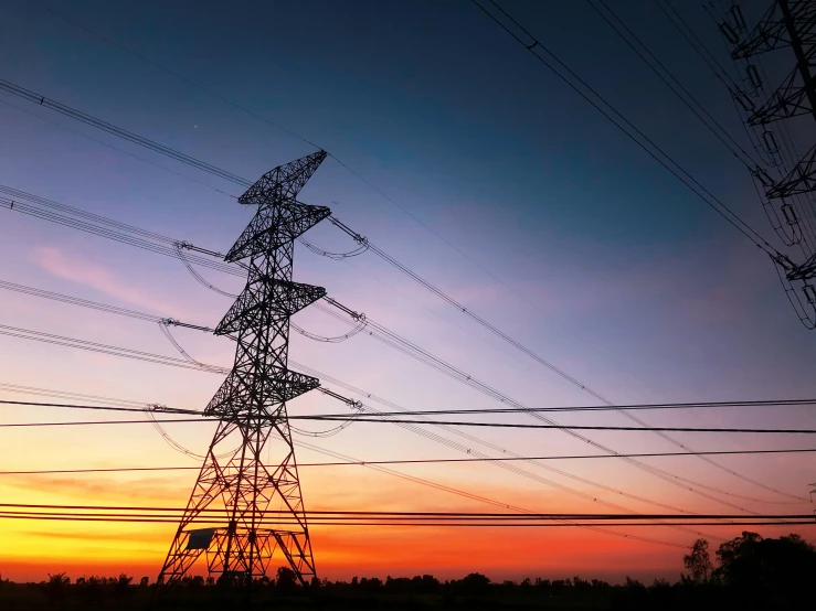 a group of electrical lines sitting on top of a field