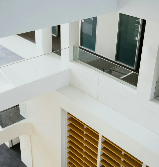 the top floor of a building with wooden shutters