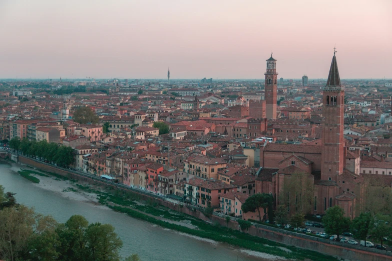 there are buildings and a river running in the city