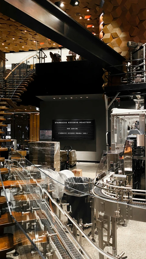 an inside view of a restaurant with a few shelves full of food