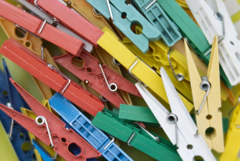 a number of colorful scissors in close proximity