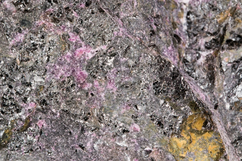 rocks covered in pink and black speckles