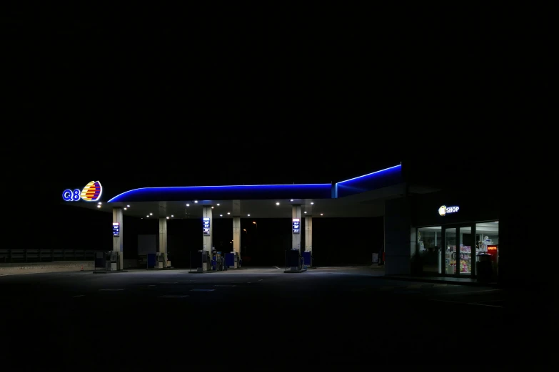 the gas station is at night time
