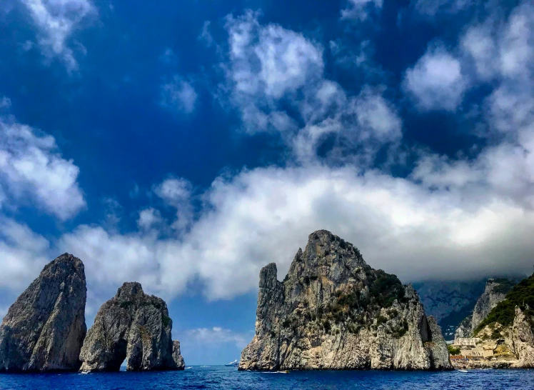 three large rocky outcrops on a cloudy day