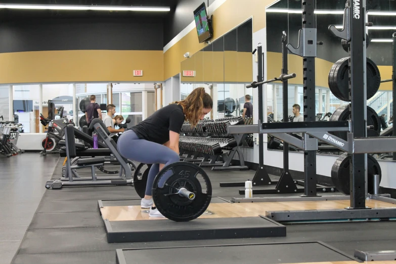 a girl working out with her gym equipment