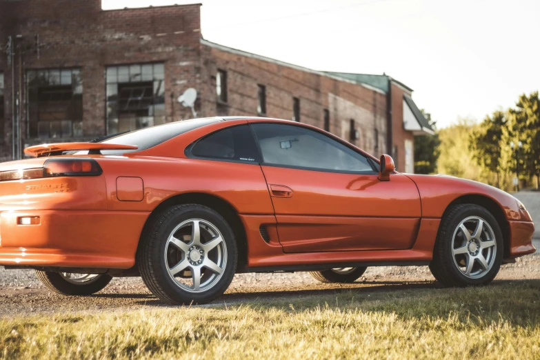 this is an image of a orange sport car