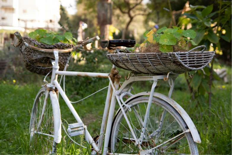 an old bicycle with a basket on the front