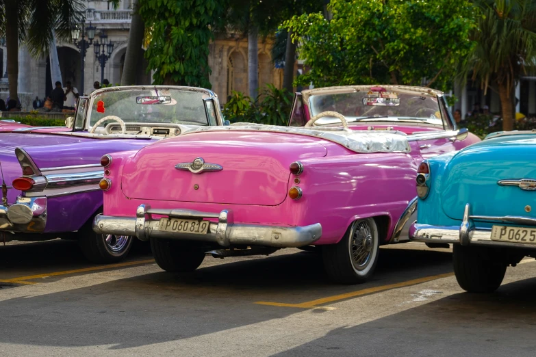 classic car in color display on city street