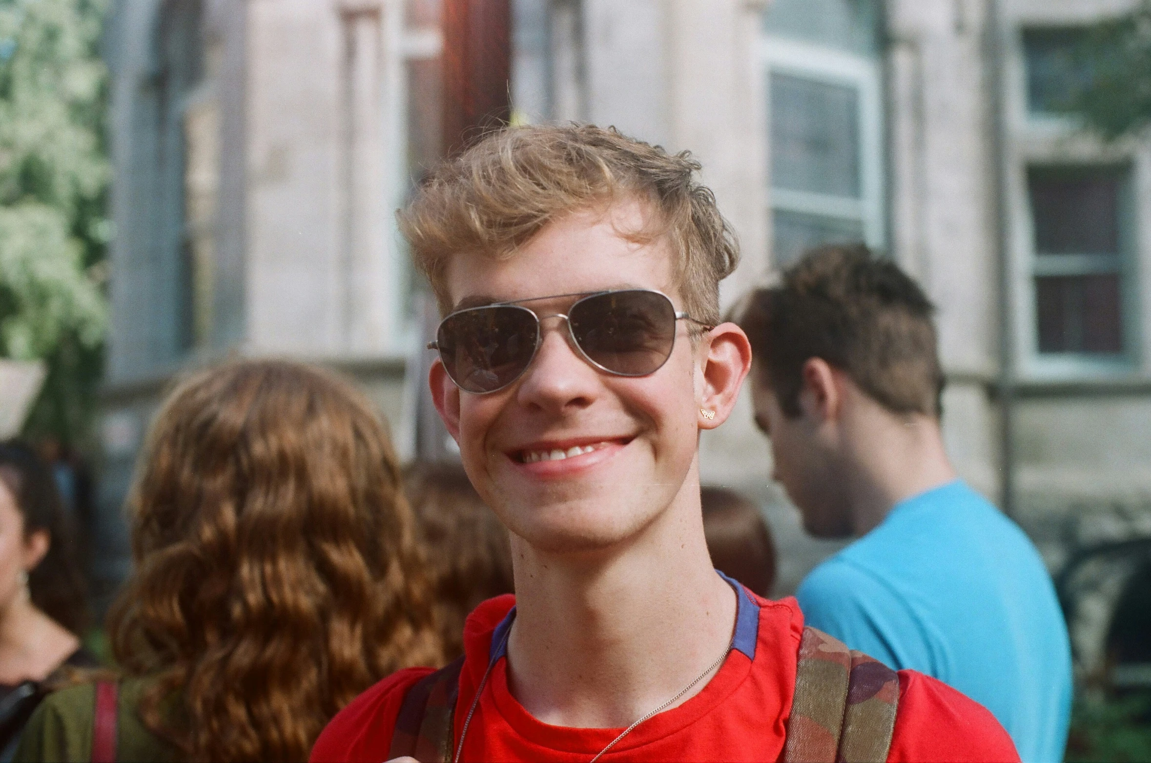 a man wearing sunglasses posing for a po