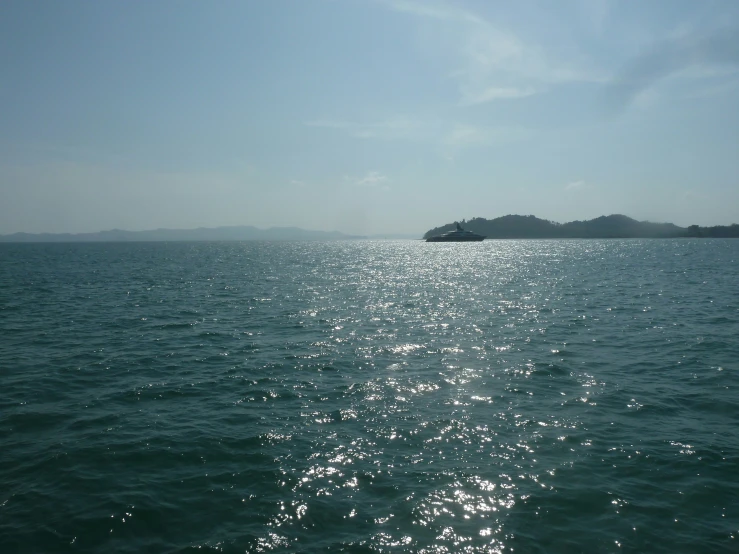 this image shows the back of a small island in the ocean