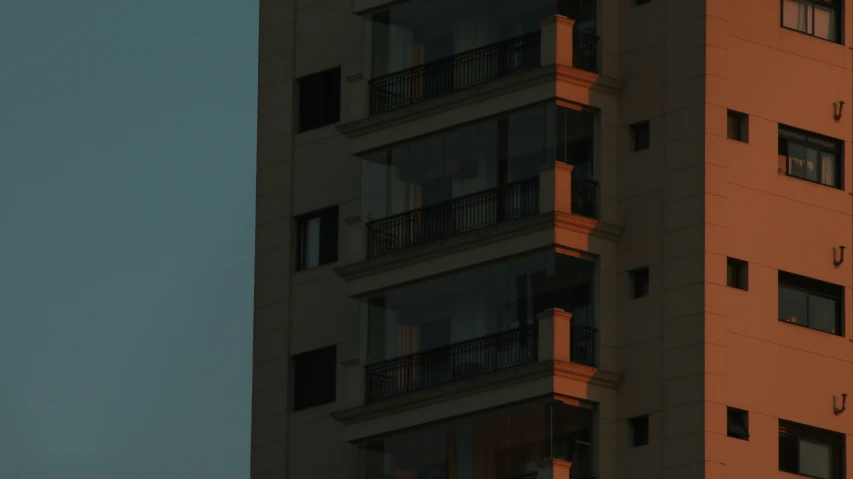 the back of a tall building with balconies