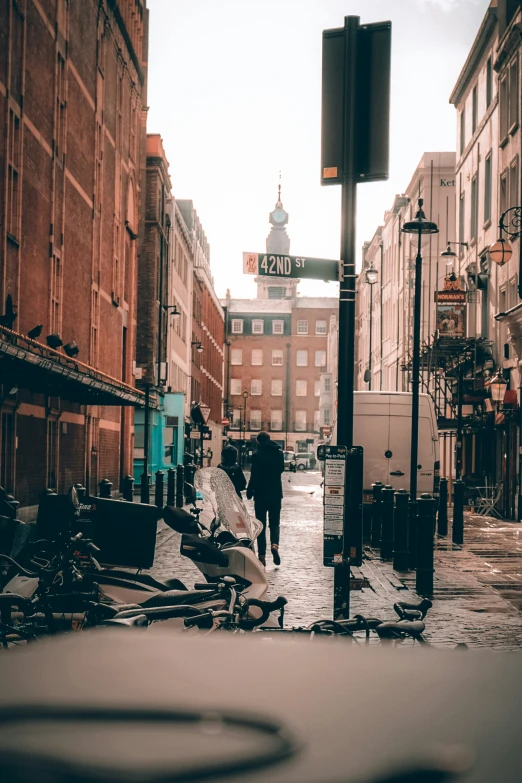 a picture of people walking down the street