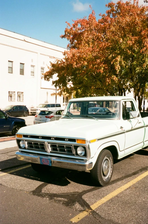 a pickup truck parked in a parking lot