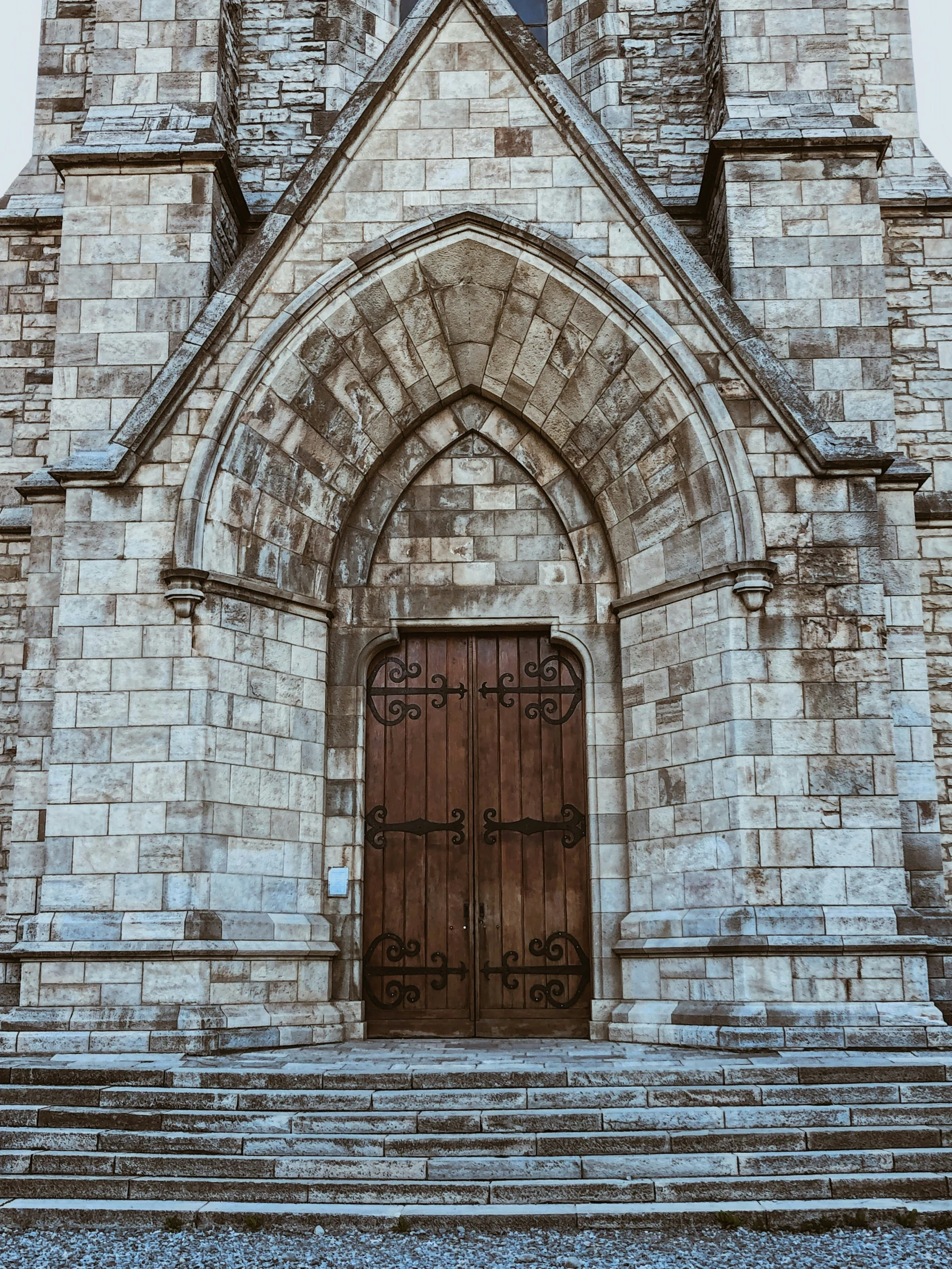 the old stone church has a double door