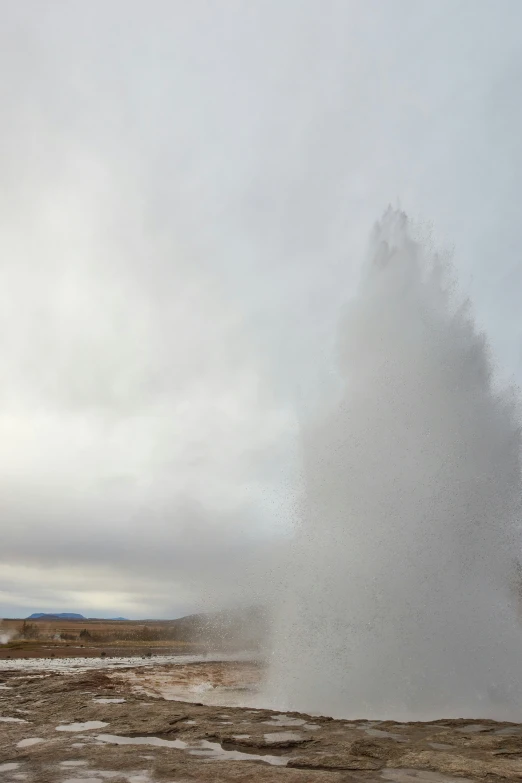 a large geyser spewing out water into the air