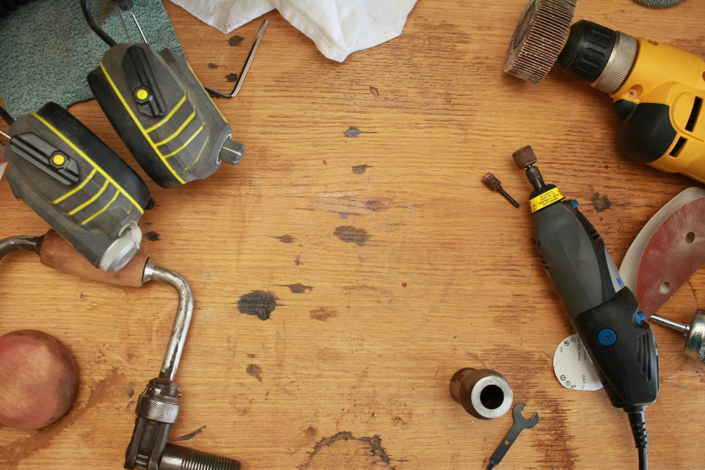 a collection of tools and materials laid out on a table