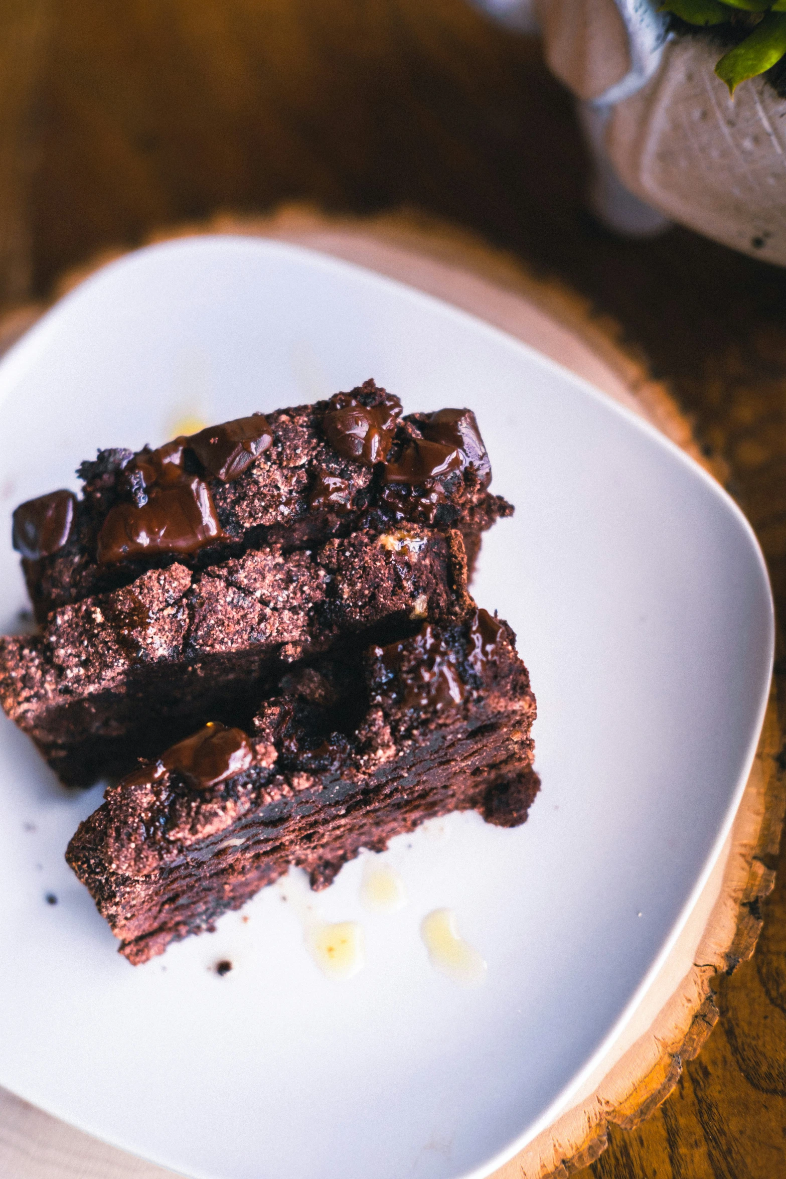 a white plate filled with chocolate brownies