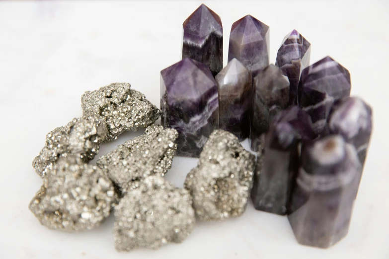 various stones in different colors are set on a table