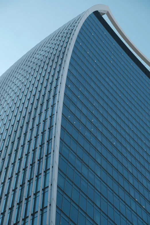 an airplane flying in front of a building