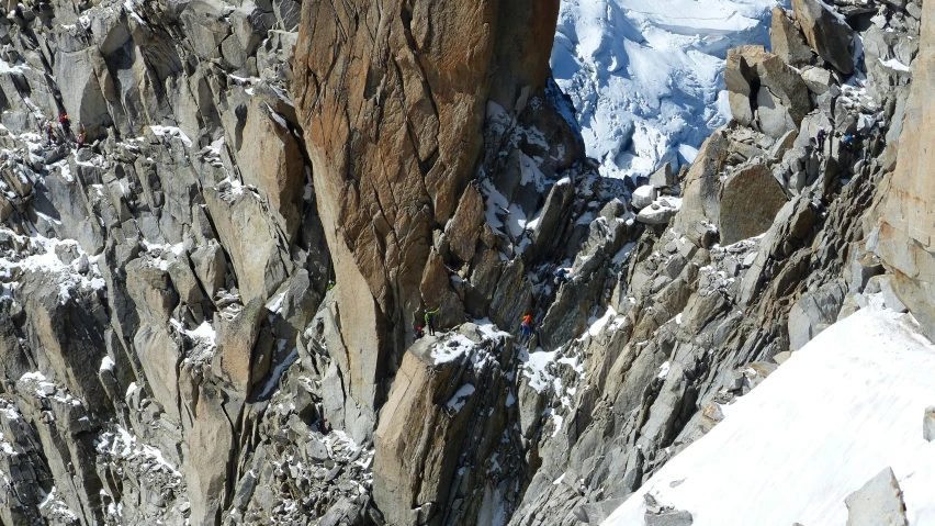 a person climbing a mountain, with the other side missing