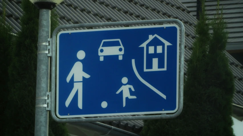 the sign indicates that the street is to be filled with people