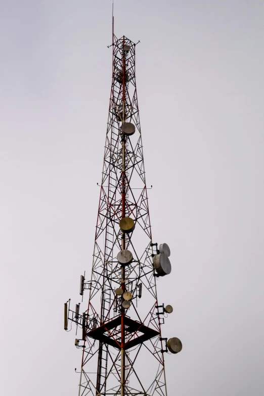 a very large tower that has some electronic items in it