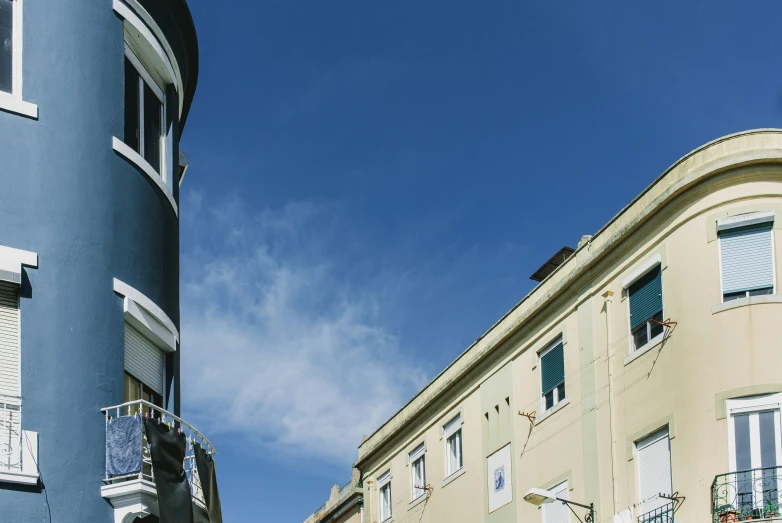 a street with a building and some buildings