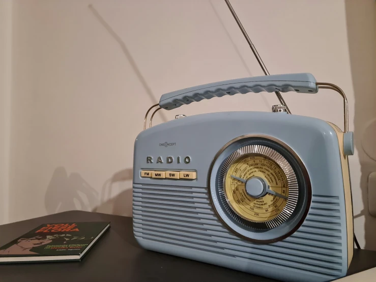 the radio was left on the table in the room