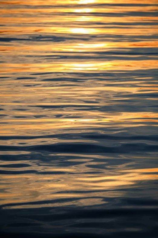 a view of some very pretty clouds in the water