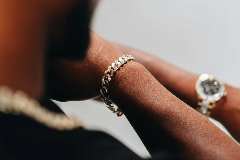 a person holding onto a ring while wearing it