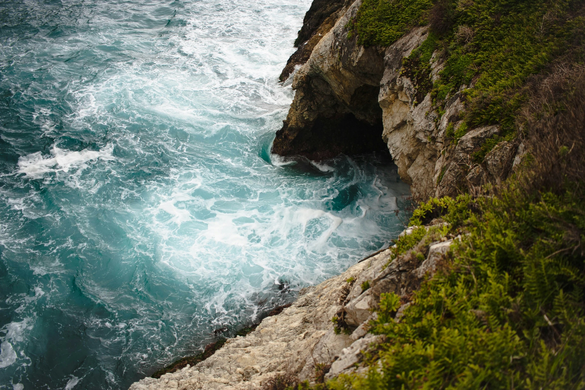 the water is dark blue and very choppy