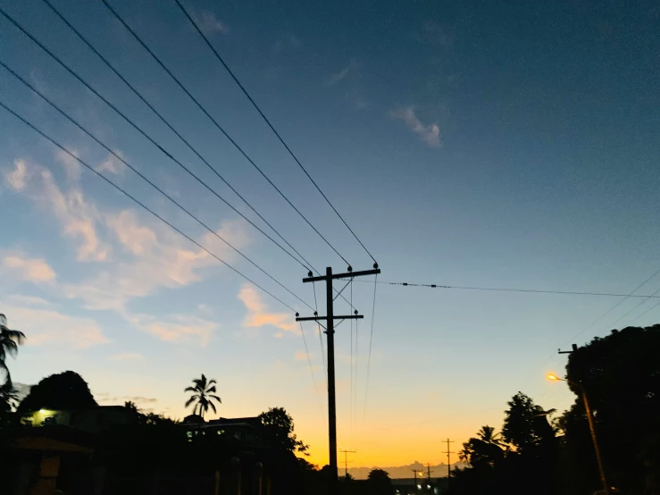 an electric line hangs above an intersection