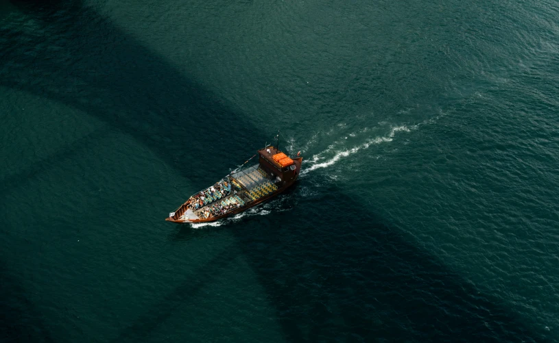 there is a large boat going under a bridge