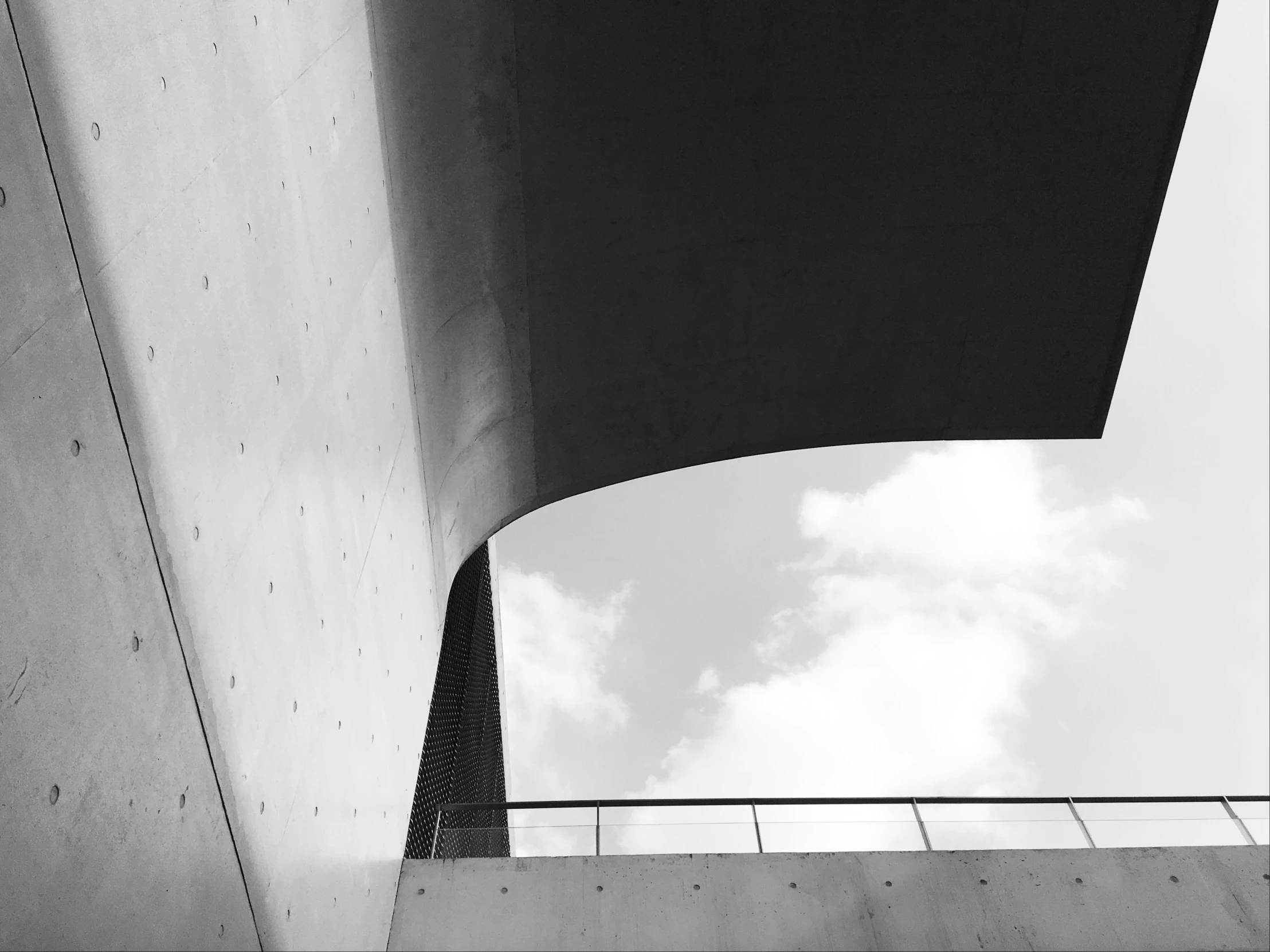 a black and white pograph of a bridge